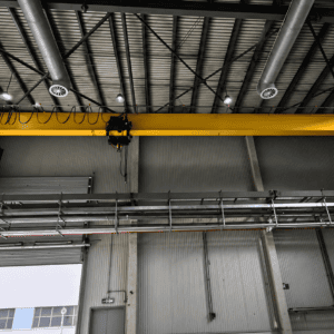 European single girder overhead crane operating in precision manufacturing workshop