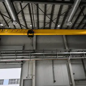 European single girder overhead crane operating in precision manufacturing workshop