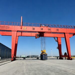Container gantry crane loading ISO containers in rail terminal