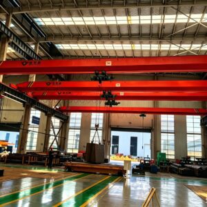 Electric single girder overhead crane lifting materials in factory