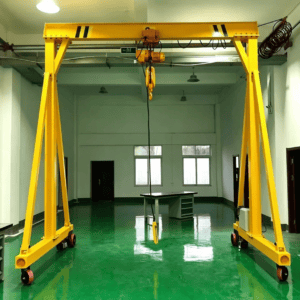 Mobile light duty gantry crane with electric chain hoist on epoxy floor