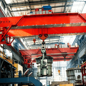 Cranox metallurgical double girder overhead crane lifting molten metal ladle in foundry workshop