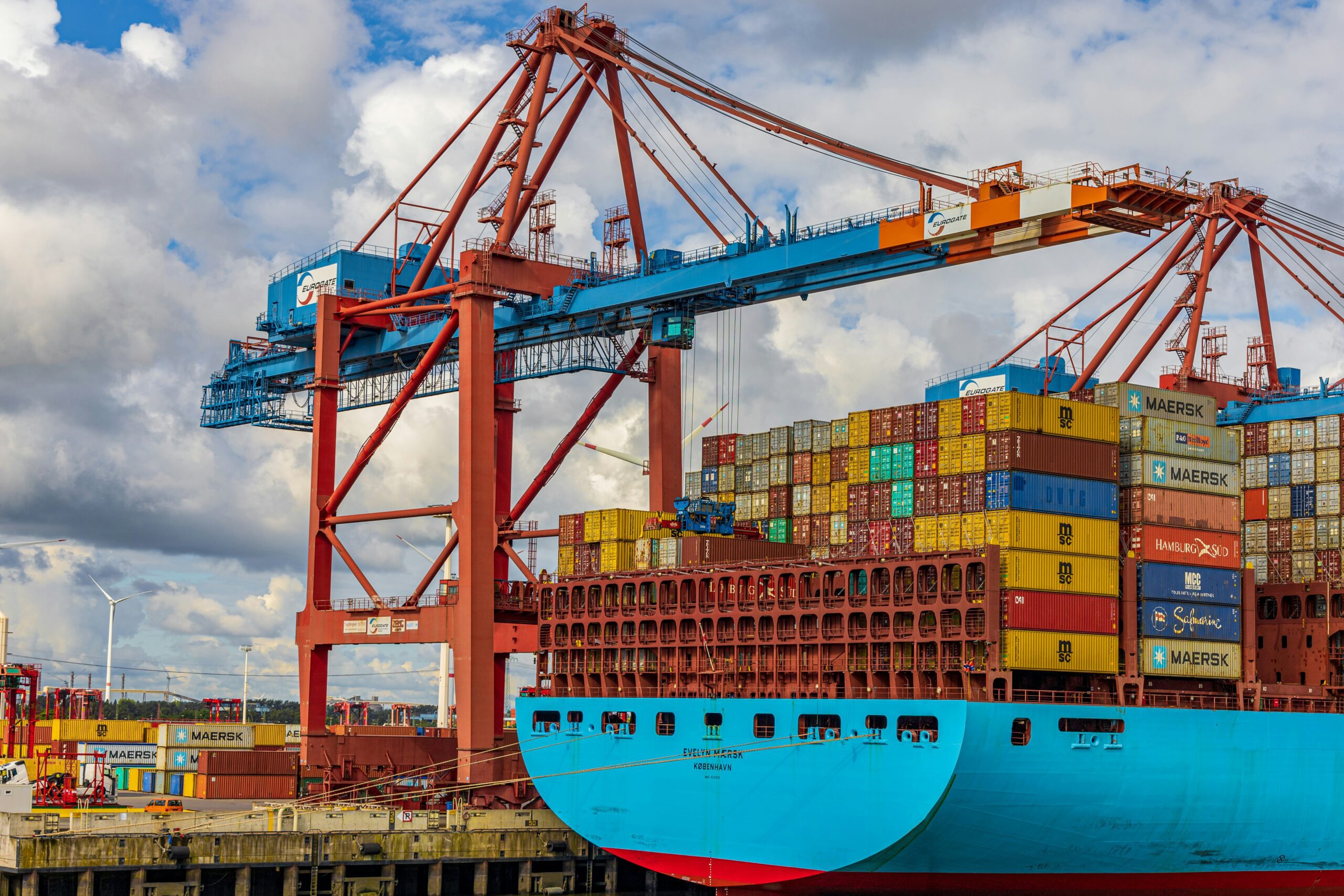 Cranox container crane handling freight containers in port logistics yard