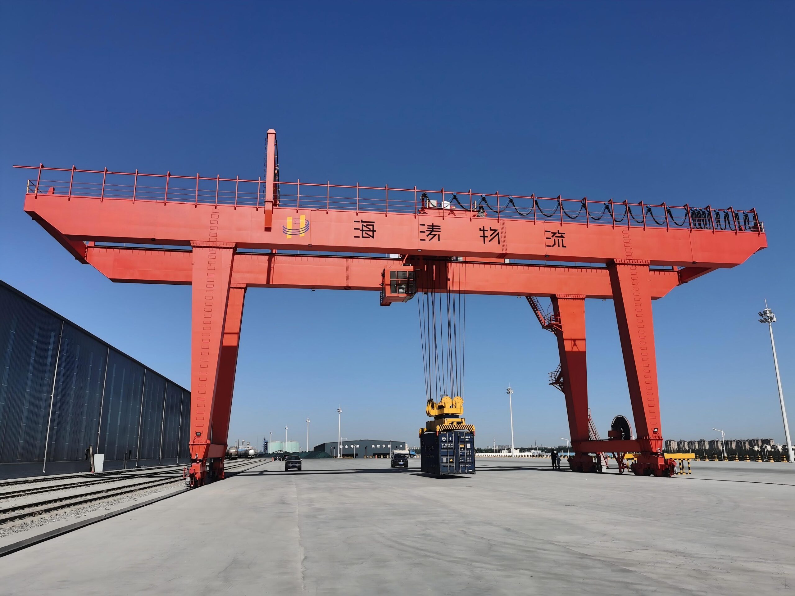 Cranox container crane handling freight containers in port logistics yard